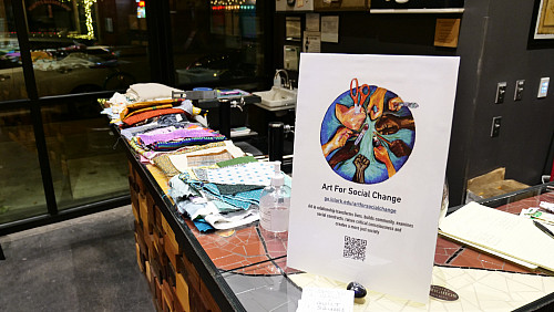 Art for Social Change set up in the lobby of The Vault.